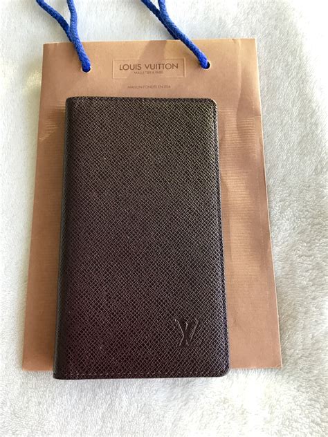 louis vuitton taiga wallet replica|check for louis vuitton wallet.